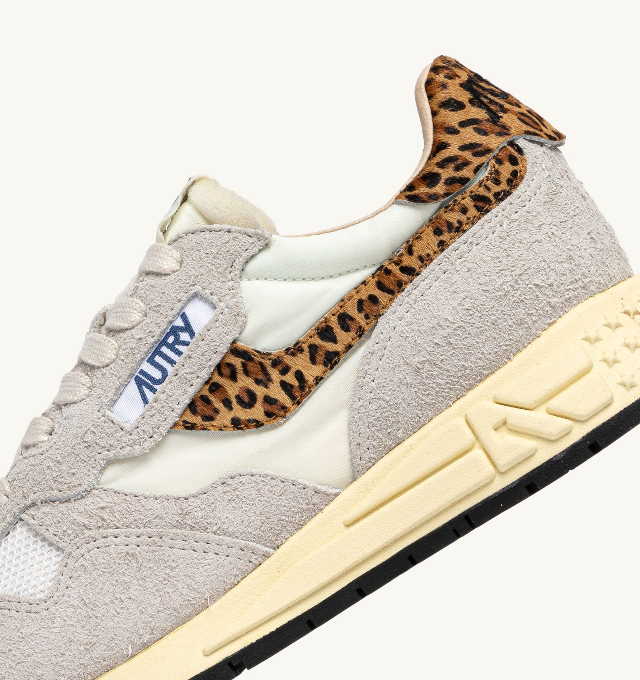 BASKETS REELWIND LOW EN NYLON ET DAIM BLANC ET LEOPARD